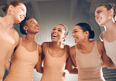 Buy stock photo Shot of a group of ballet dancers laughing together on a stage