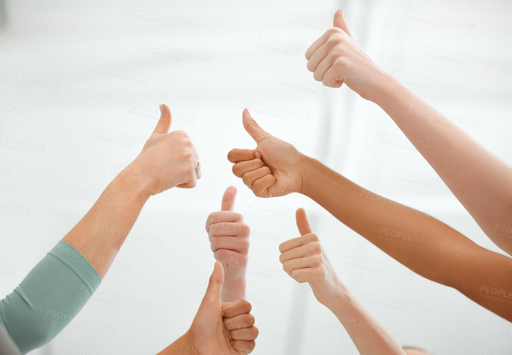 Buy stock photo Shot of a group of unrecognizable women showing thumbs up