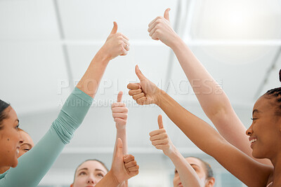 Buy stock photo Shot of a group of unrecognizable women showing thumbs up