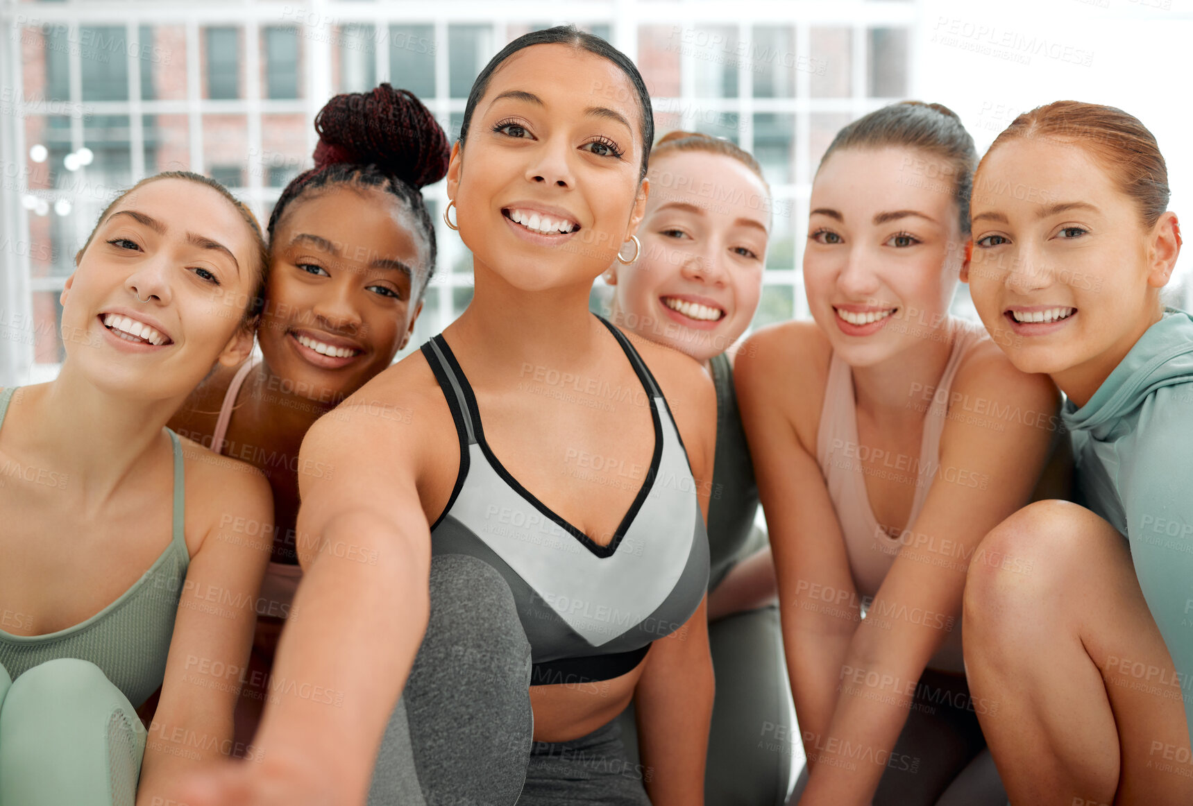 Buy stock photo Shot of a fitness group posing together
