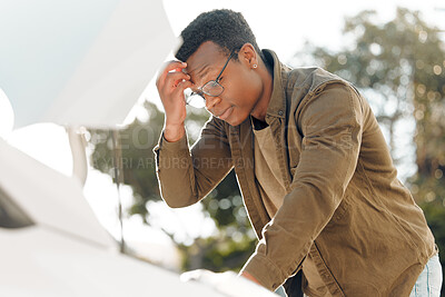 Buy stock photo Shot of a young male stuck with his car outside