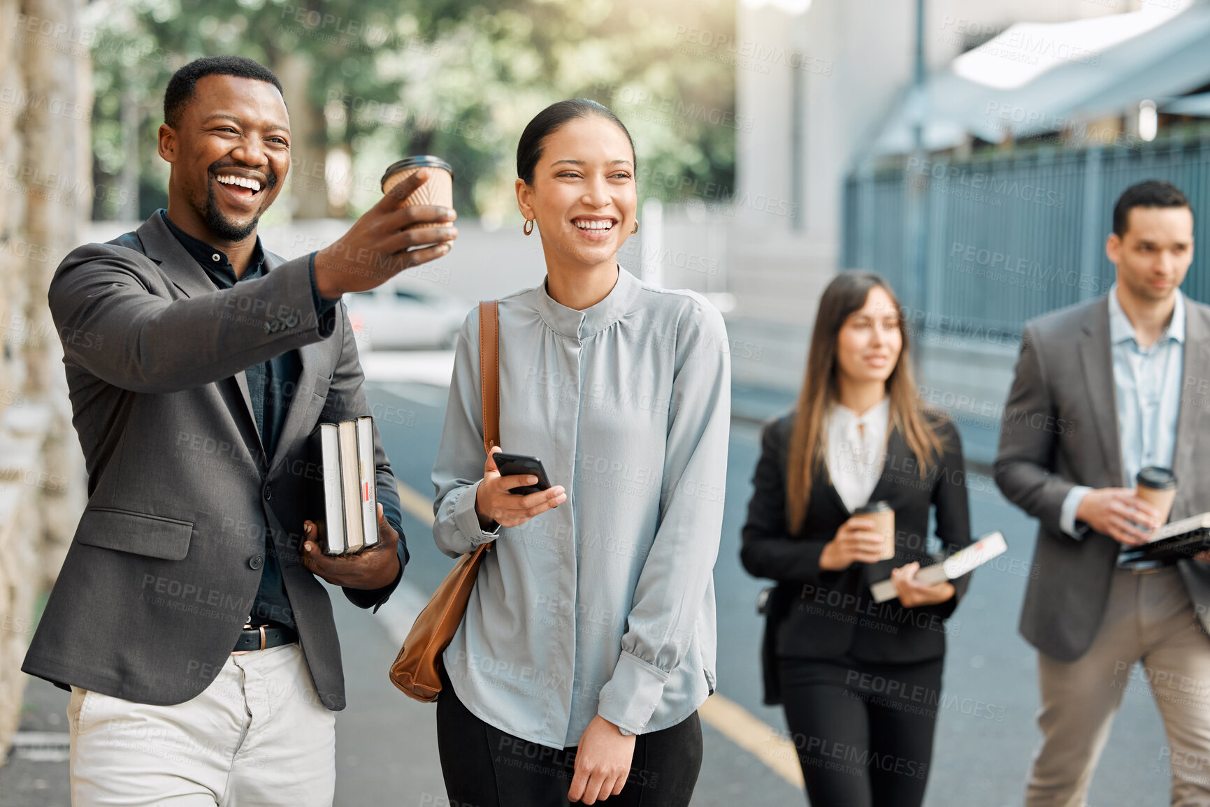 Buy stock photo Shot of a group of lawyers walking to work together