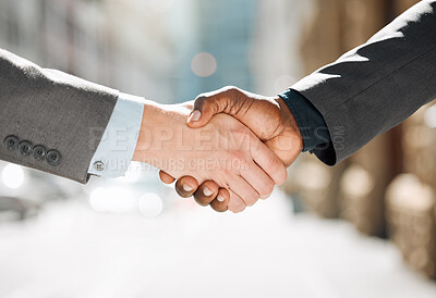 Buy stock photo Shot of two lawyers shaking hands in meeting