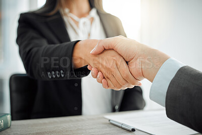 Buy stock photo Shot of two lawyers shaking hands in greeting
