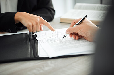 Buy stock photo Shot of a lawyer helping a client sign a contract