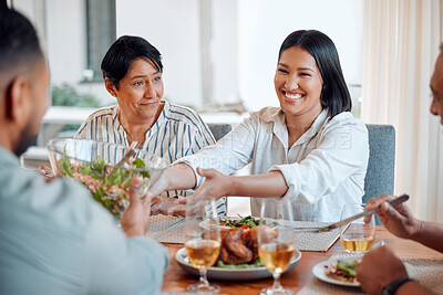 Buy stock photo Shot of a family having lunch together at home