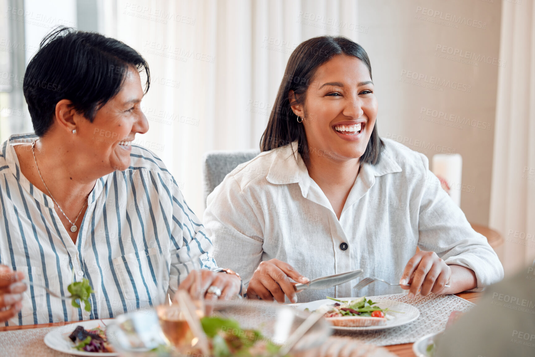 Buy stock photo Shot of a family having lunch together at home