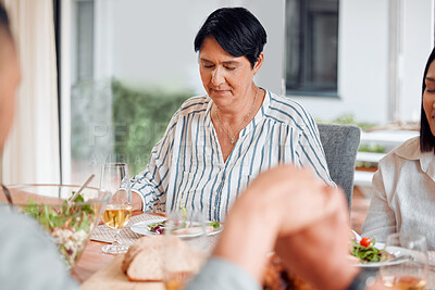 Buy stock photo Shot of a family having lunch together at home