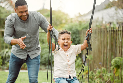 Buy stock photo Shot of a father and son playing outside