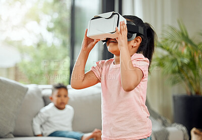 Buy stock photo Young girl with VR goggles, gaming and metaverse with futuristic tech, child experience simulation at family home. Female kid in living room with video games, virtual reality and future technology