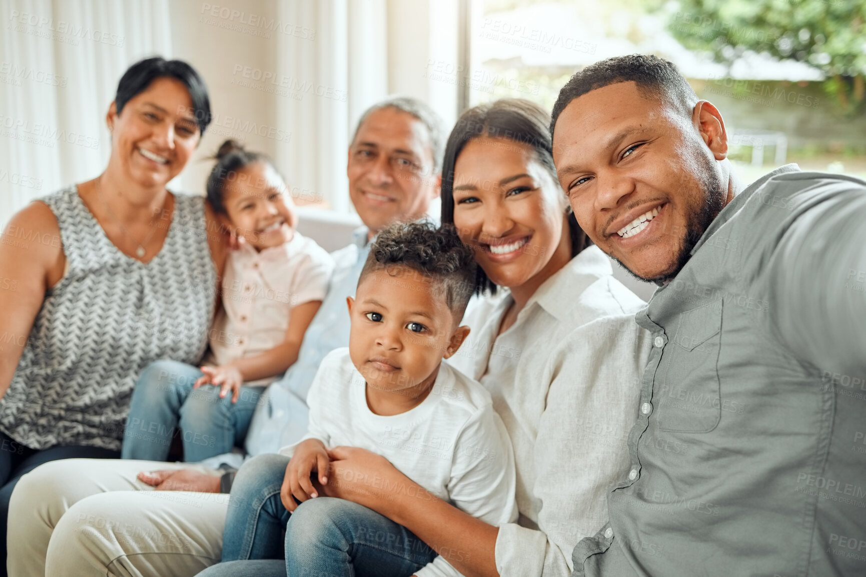 Buy stock photo Happy big family, portrait smile and selfie on living room sofa together for holiday, weekend or bonding at home. Grandparents, parents and kids smiling for fun photo, memory or vlog on lounge couch