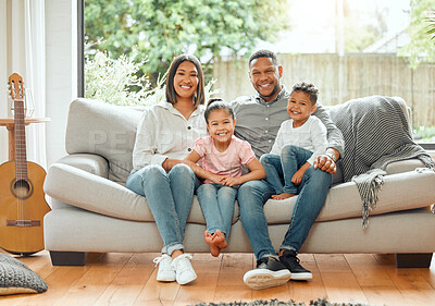 Buy stock photo Family in portrait, parents and children smile, relax on couch with happiness and love while at home. Bonding, care and happy relationship, people together in house living room with mom, dad and kids