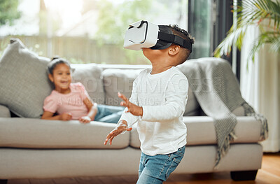 Buy stock photo Young boy with VR goggles, gaming and metaverse with futuristic tech, child experience simulation at family home. Male kid in living room with video games, virtual reality and future technology