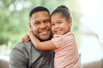Buy stock photo Family, father hug daughter and smile in portrait with bonding, love and care, happiness at home. Happy man with young girl and affection in relationship, people relax together with bond and trust