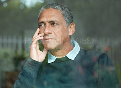 Buy stock photo Shot of an elderly man enjoying the view from his window