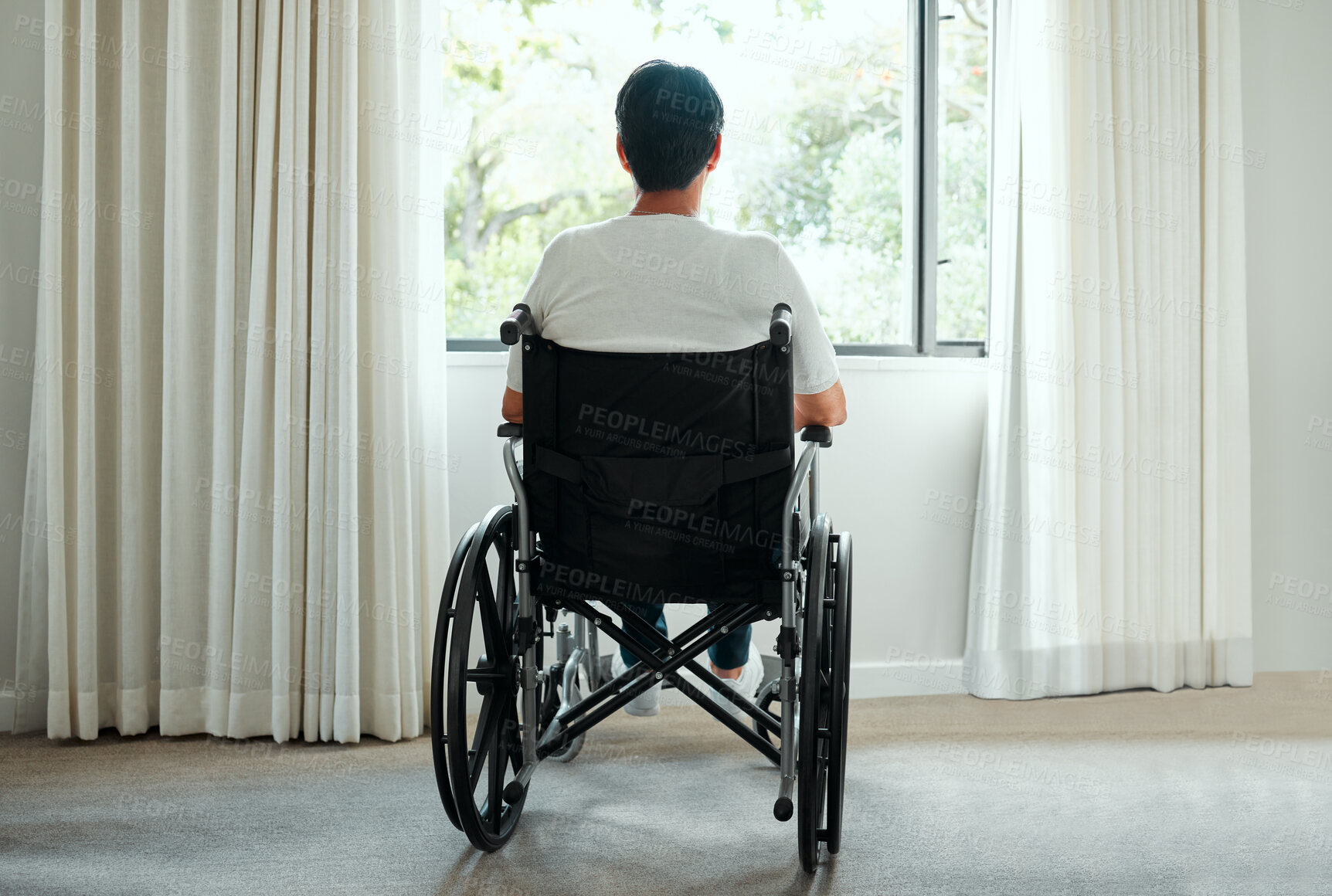 Buy stock photo Back view, wheelchair and person in home by window for thinking, reflection or remember past memory. Handicap, paralysis and patient with disability after injury or health rehabilitation for accident