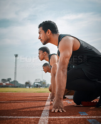 Buy stock photo Race, start and group of men on sports track for speed challenge, marathon event and field athlete at arena. Ready, set and people at stadium for competition, fitness or professional distance running