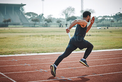 Buy stock photo Stadium, man relay running and athlete on a runner and arena track for sprint race training. Fast, run and sports exercise of a male person in marathon for fitness and workout outdoor on a field