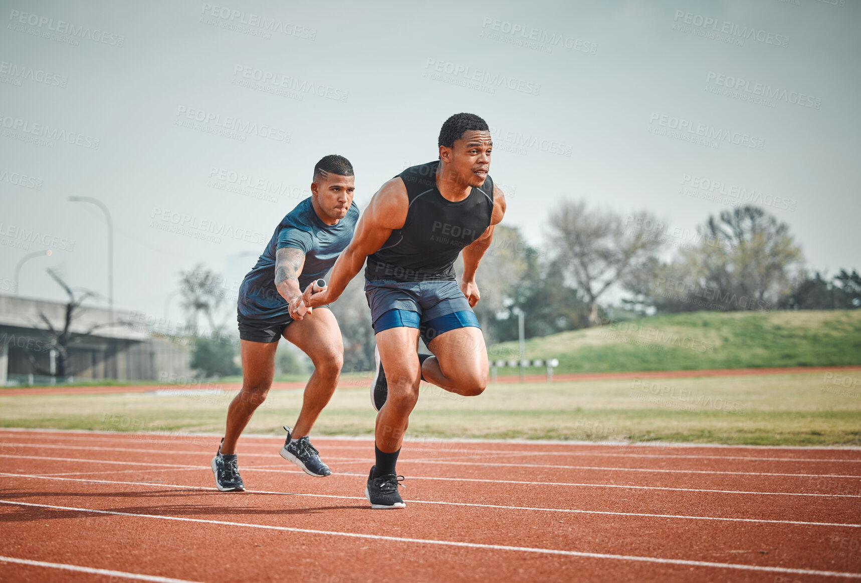 Buy stock photo Relay, race and men with baton for teamwork, speed challenge and track sports event at arena. Synergy, collaboration and athlete partnership in running competition, fitness and support at stadium