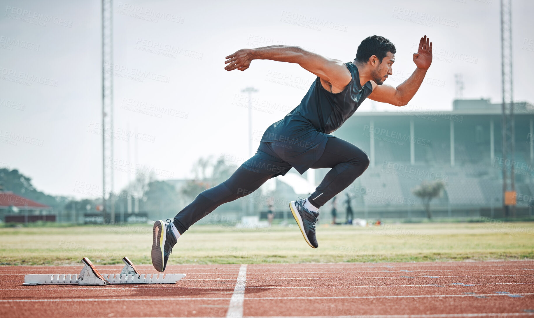 Buy stock photo Stadium, man running and athlete on a runner and arena track for sprint race training. Fast, run and sports exercise of a male person in marathon for fitness and workout outdoor on a field for health