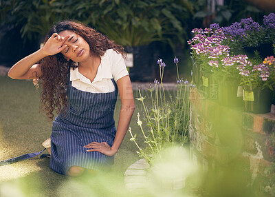 Buy stock photo Stress, fatigue and woman gardener in nature working overtime for plant development or growth. Burnout, exhausted and female florist planting flowers in outdoor nursery at eco friendly shop.