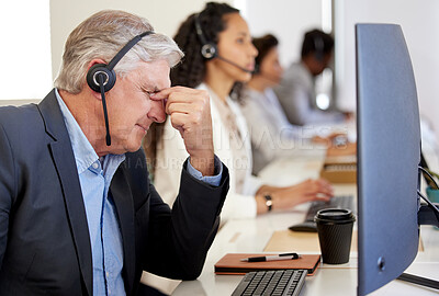 Buy stock photo Stress, tired and mature man in call center with headache, pain or burnout for customer service mistake. Fatigue, telemarketing and frustrated sales manager with challenge, debt or fail on computer