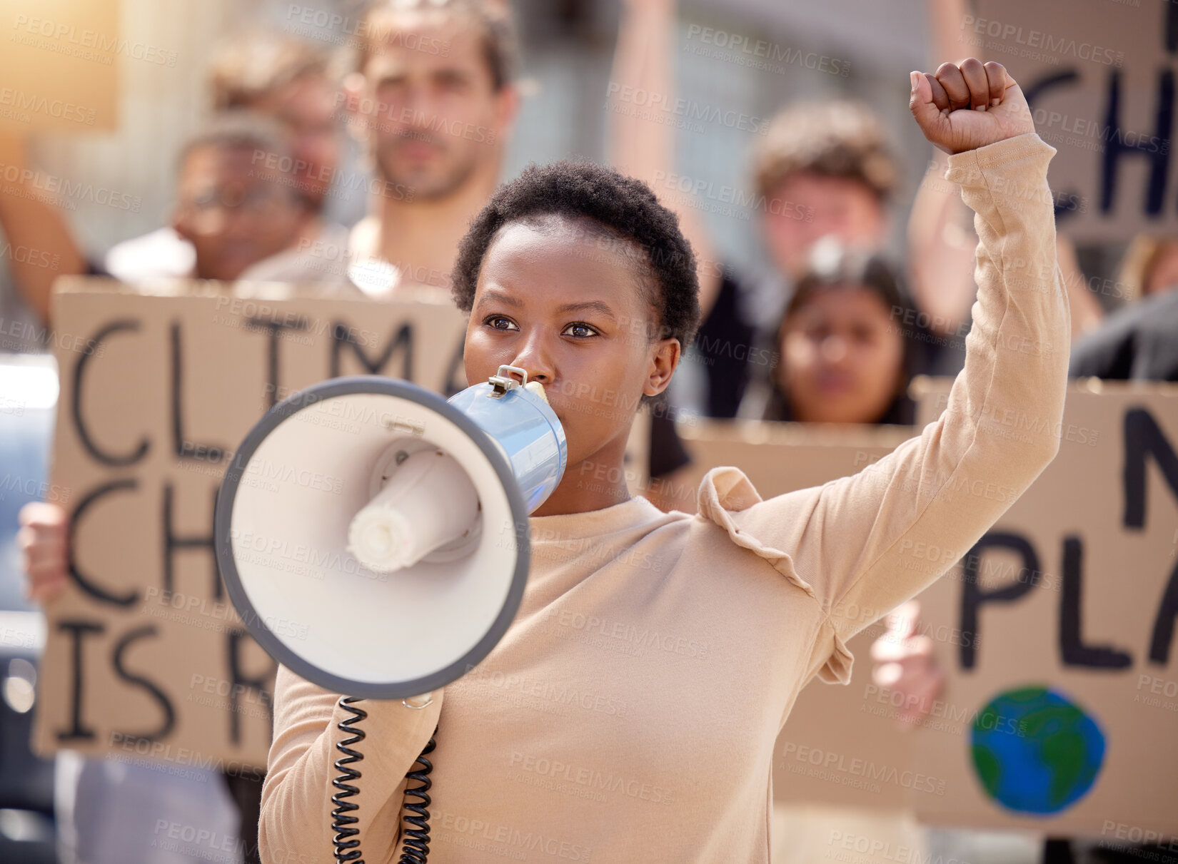 Buy stock photo Woman, protest and megaphone with group for climate change support, global warming or crowd. Female person, fist and march rally with poster for global crisis with environment, planet or leadership