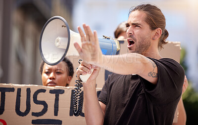 Buy stock photo Megaphone, man and stop hand sign at protest for opinion, human rights and freedom in Portugal. Male activist, shouting and speech at demonstration, rally and passionate for change and equality