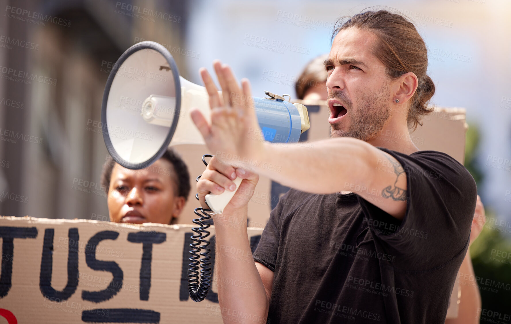 Buy stock photo Megaphone, man and stop hand sign at protest for opinion, human rights and freedom in Portugal. Male activist, shouting and speech at demonstration, rally and passionate for change and equality