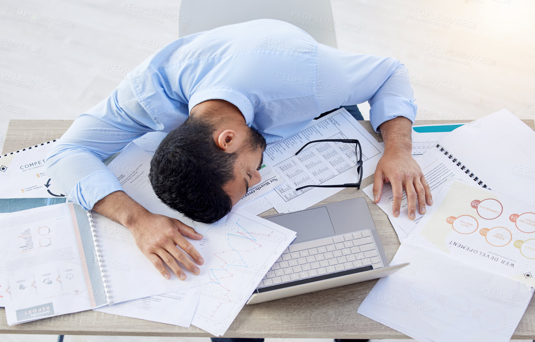 Buy stock photo Business man, tired and sleeping at office desk with burnout risk, overworked and nap for low energy. workplace, exhausted or fatigue of asleep male accountant, finance documents and laptop on table