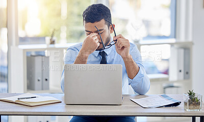 Buy stock photo Businessman, desk and laptop for burnout and stress, fatigue and overworked in office. Document, technology and financial advisor and headache for male person, computer and contract for investment