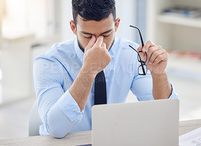 Buy stock photo Businessman, desk and laptop for burnout and stress, fatigue and overworked in office. Document, technology and financial advisor and headache for male person, computer and contract for investment
