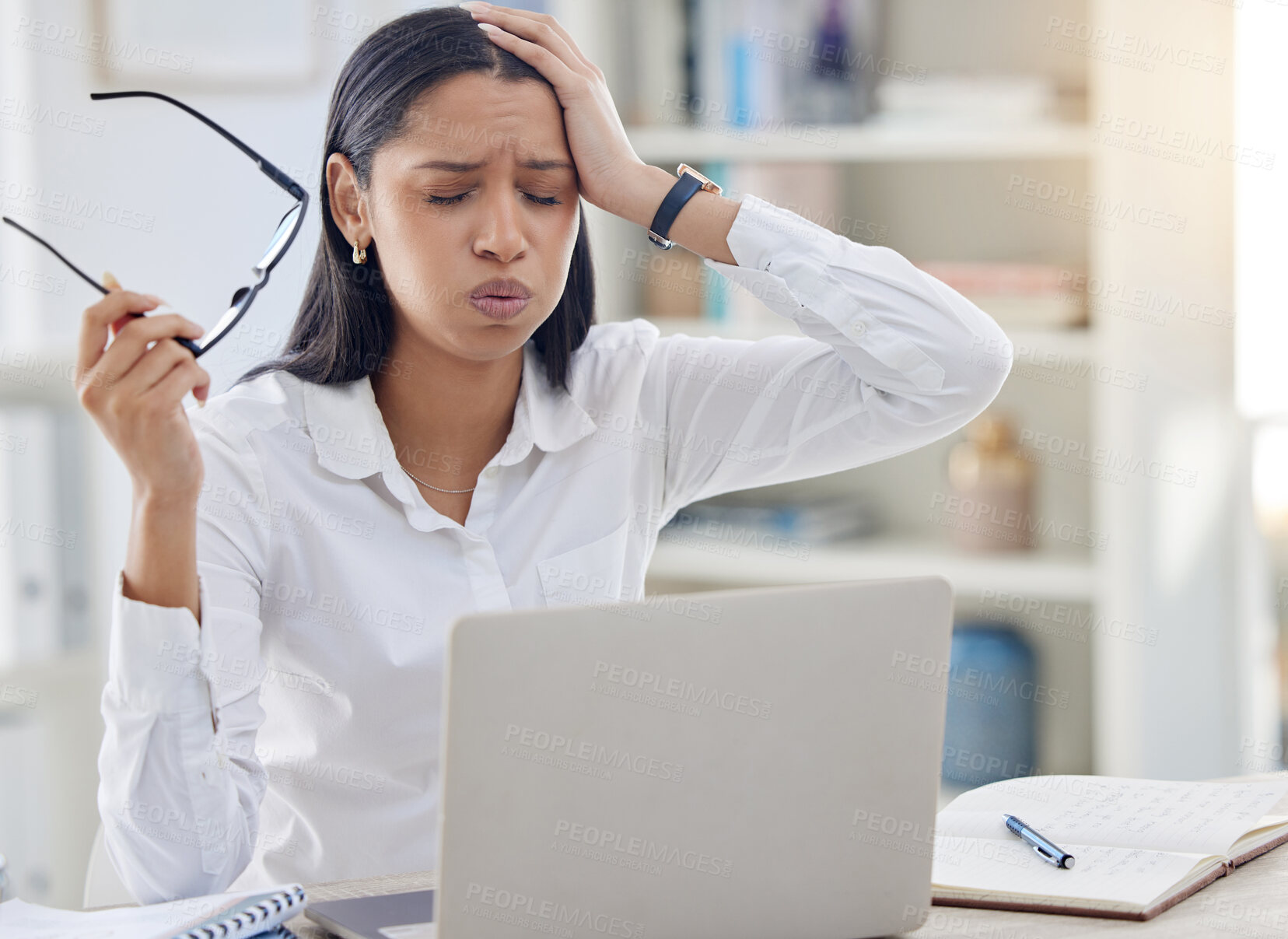 Buy stock photo Migraine, glasses and business woman with pain in office for editing report, burnout or project deadline. Fatigue, laptop and tired journalist, editor or professional employee at desk for news agency