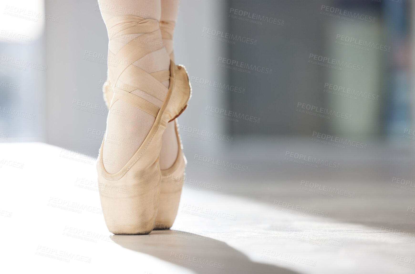 Buy stock photo Performance, ballet and shoes on floor with child for balance, lesson and kid in academy. Talent, young girl or feet and education in dance class for student, wellness and training for sport or art