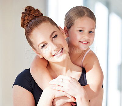 Buy stock photo Shot of a ballet teacher and student in a dance studio