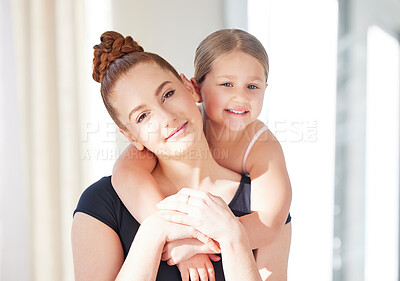 Buy stock photo Shot of a ballet teacher and student in a dance studio