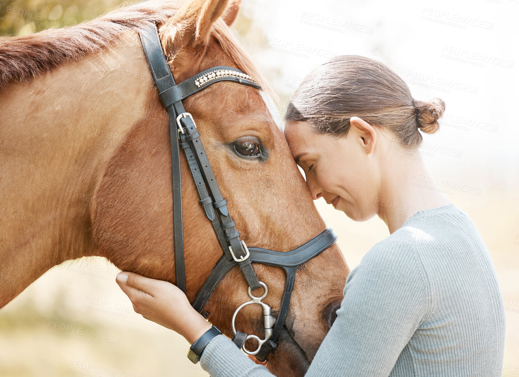 Buy stock photo Woman, horse and smile on forehead touch in farm for ride with care, love and hobby in Texas. Female person, countryside and happy in forest for adventure, fun and relax on break for activity