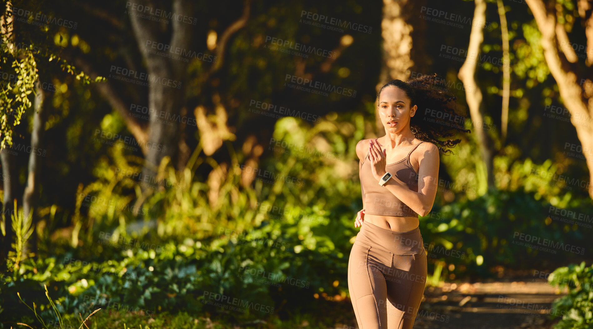 Buy stock photo Fitness, woman and running in park for cardio exercise, workout or training in the nature outdoors. Female person, athlete or runner exercising for healthy wellness, run or sports marathon in forest