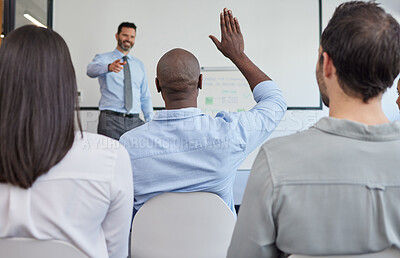 Buy stock photo Business people, conference and team workshop in office, man hand raised with question and presentation in business seminar. Company, team building, speaker and staff with corporate group and leader.
