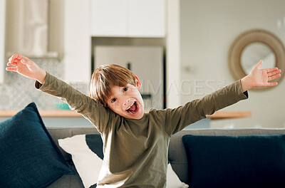 Buy stock photo Boy, portrait and excited child on sofa for achievement, winning or celebration in living room. Happiness, wow and young kid with scream for development, good news or surprise announcement in home