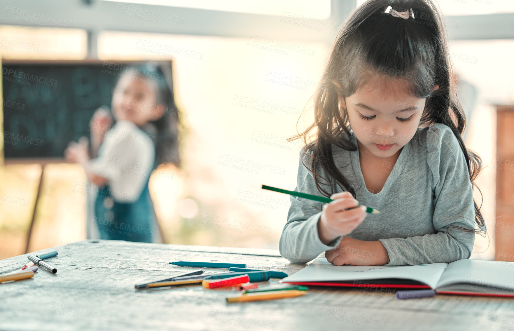 Buy stock photo Girl, child and sketch in home for learning, education and crayons for creative art at table. Female person, kid and writing activity for brain development, books and drawing or practice skills