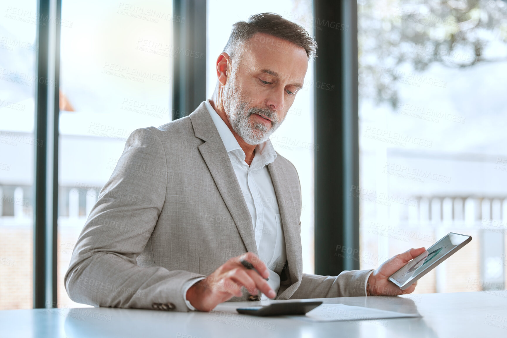 Buy stock photo Businessman, tablet and calculator on desk for planning investment, asset management and research in office. Corporate guy, tech and counting machine for budget, connection and financial stability