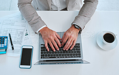 Buy stock photo Shot of a unrecognizable man using a laptop in a office