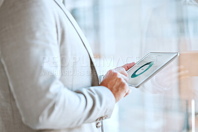 Buy stock photo Shot of a unrecognizable male using a tablet at home