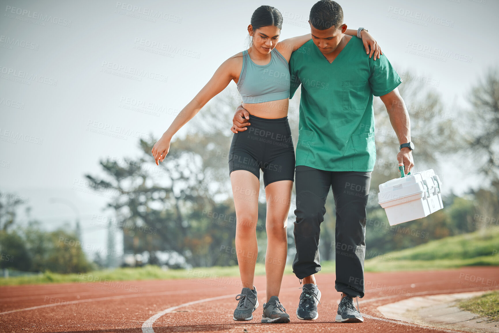 Buy stock photo Paramedic, athlete and woman on stadium with support, injury and man with helping hand in summer. People, first aid and emergency care with sports, running and track with medical attention in Paris