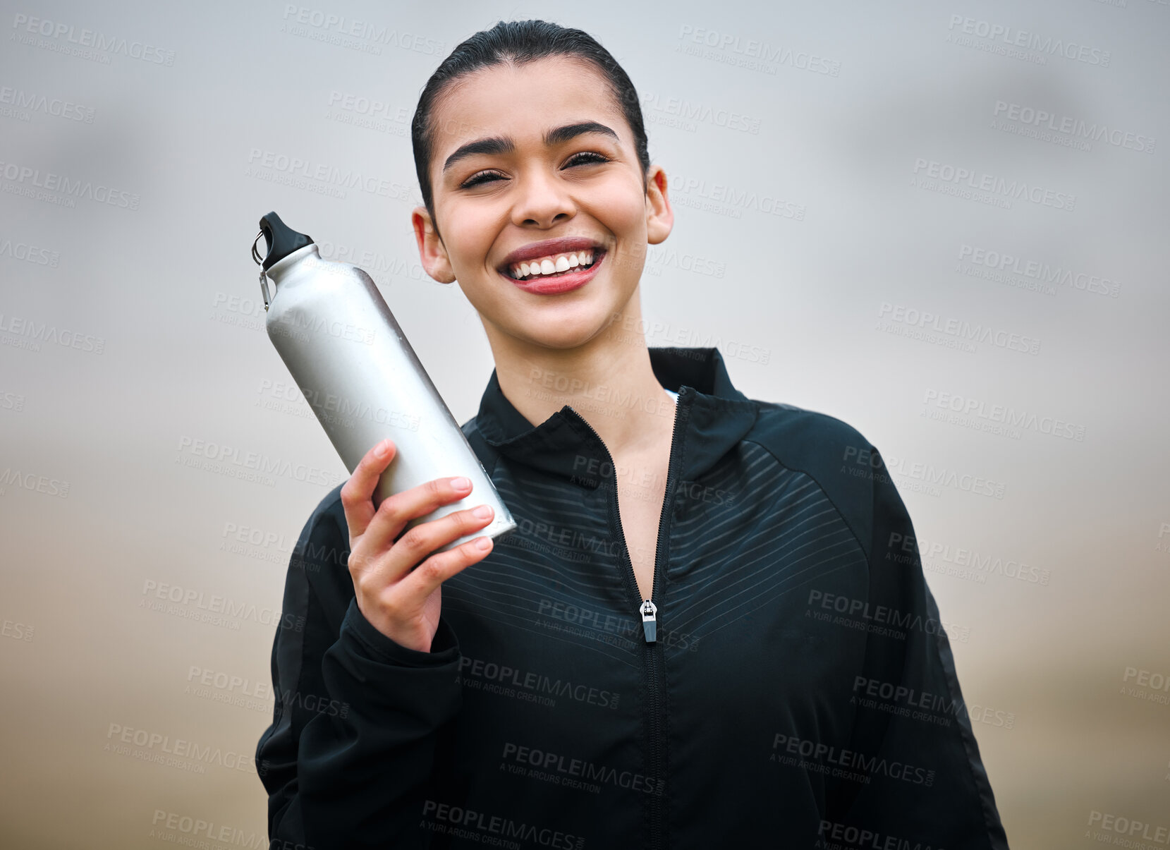 Buy stock photo Happy woman, portrait and water with bottle for hydration, thirst or natural sustainability in nature. Young female person, athlete or smile for mineral drink, beverage or flask in outdoor fitness