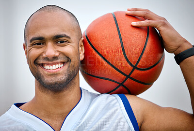 Buy stock photo Cropped portrait of a handsome young male basketball player standing outside