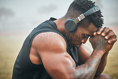 Buy stock photo Music, training and thinking with black man in park for exercise, strong and motivation. Streaming, sports podcast and radio with male athlete and headphones for muscle, workout and challenge