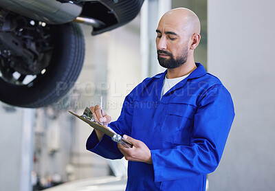 Buy stock photo Man, mechanic and writing with clipboard for service, checklist or report on general repair at workshop. Male person or mechanical engineer taking notes on car inspection or maintenance fix at garage