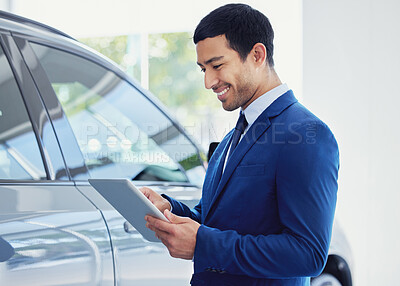 Buy stock photo Tablet, car and salesman smile at showroom, workshop or salon workplace. Internet, technology and male person at dealership for motor vehicle shopping, web scroll and email app in auto retail store.